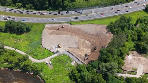 Done top down view. Circling Metrolinx construction site and DVP. Toronto. 4K. Stock Footage 288217202