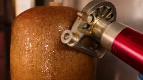 Doner meat being sliced in slow motion 스톡 동영상 274808698