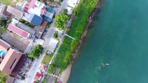 Dong Hoi on Nhat Le river, Vietnam. drone Stock Footage 248057880