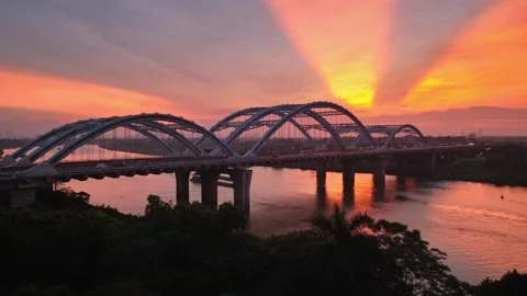 Dong Tru Bridge over the Red River at Sunset in Hanoi, Vietnam Stock Footage 344742841