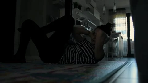 Donna trains at home Stock Footage 130532526