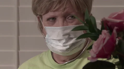 Donning masks Stock Footage 138802264