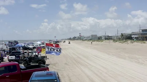 Don't Cali my Texas flag flying on the beach Stock Footage 202105581