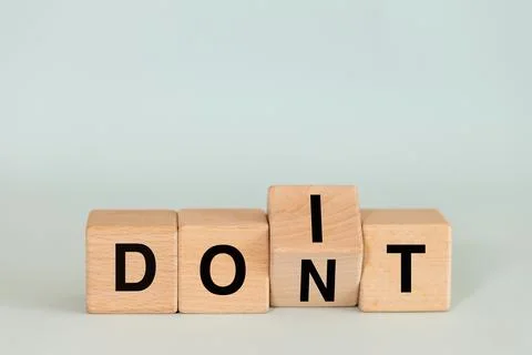 Don't do and do it. Conceptual words, don't do changing do it.  Stock Photos