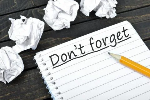 Don't forget text on notepad Stock Photos