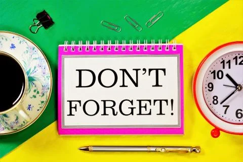 Don't forget - the text is written on the Notepad. Stock Photos