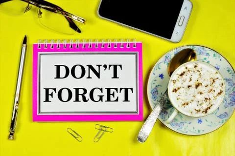 Don't forget that - the writing is on the notebook. Stock Photos