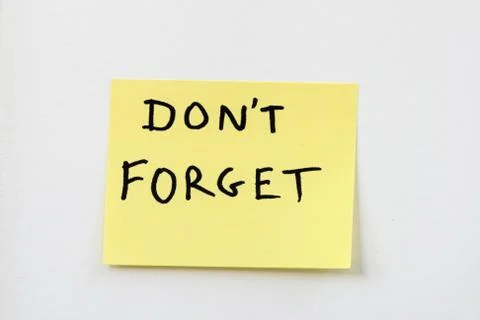 Don't forget on yellow sticky note Stock Photos