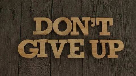 Don't give up, text words typography written with wooden letter, life and b.. Stock Footage 233547724
