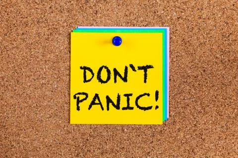 Don`t panic! on corkboard Stock Photos