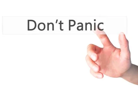 Don't Panic - Hand pressing a button on blurred background concept on visual  Foto stock