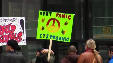'Don't Panic It's Organic' Marijuana Legalization Sign Stock Footage 11135142