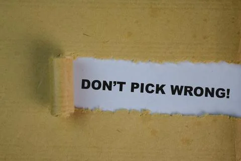 Don't pick wrong Text written in torn paper Stock Photos