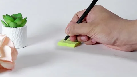Dont slow down written on the paper note Stock Footage 232598635