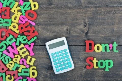 Don't stop on wooden table Stock-Fotos
