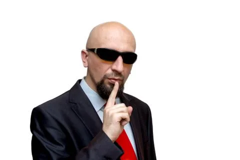 Don't talk, keep quiet, tough bald man with dark glasses Photos