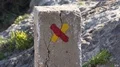 Don't walk here sign painted on rock stone at Algarve coastline Portugal 4k or 4k+ Resolution