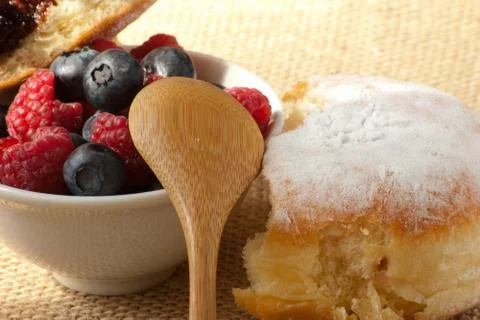 Donut with different berries Stock Photos