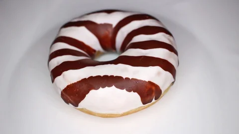 Donut mini donuts food closeup texture pattern. Seamless looping video footage Stock Footage 102591990
