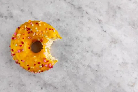 Donut with one bite missing Stock Photos