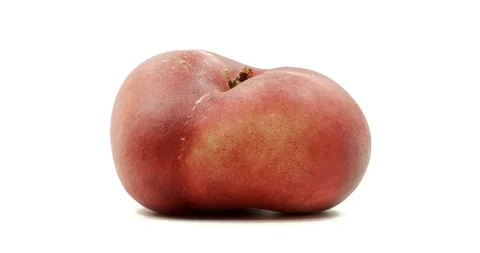 Donut peach isolated rotates on itself on white background. Stock Footage 113352554