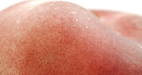 Donut peach isolated rotates on itself on white background. Stock Footage 113357905