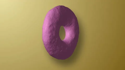 Donut rotates on an orange background Stock Footage 165994446
