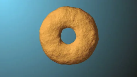 Donut rotating 360 degrees on blue background Stock Footage 165994361