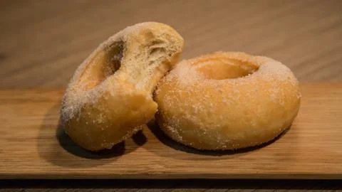 Donut table toped with sugar. 库存照片