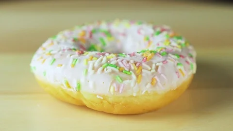 Donut on the table. video rotation. Stock Footage 93078616