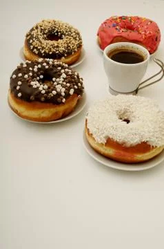Donuts and coffee Stock Photos
