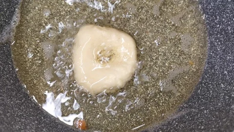 Donuts are deep fried Video stock 121352492