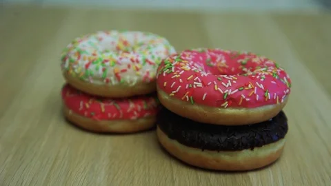 Donuts are stacked on top of each other Stock Footage 90305052