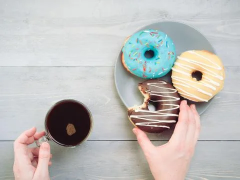 Donuts on blue background , copy space, top view 스톡 사진