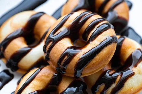 Donuts with chocolate Stock Photos