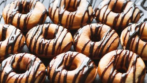 Donuts with chocolate Stock Photos