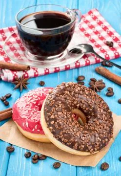 Donuts with coffee Stock Photos