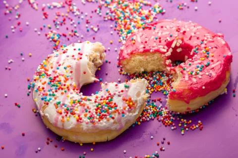 Donuts on color background. Stock Photos