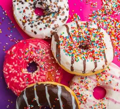 Donuts on color background Stock Photos