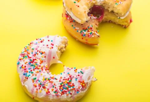 Donuts on color background Stock Photos