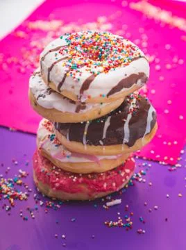Donuts on color background Stock Photos