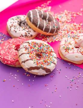 Donuts on color background Stock Photos