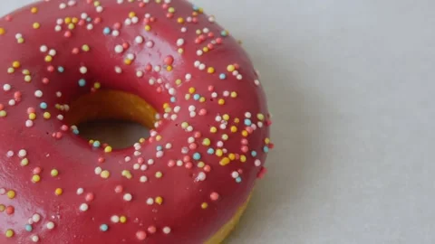 Donuts with colorful icing. Stock Footage 312037991