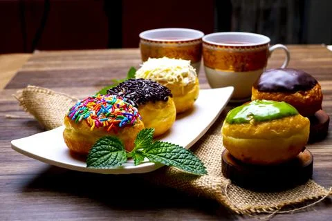 Donuts with colourfull meses Stock Photos