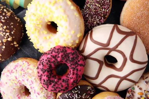 Donuts in different glazes Stock Photos