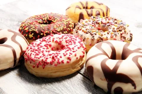 Donuts in different glazes Stock Photos