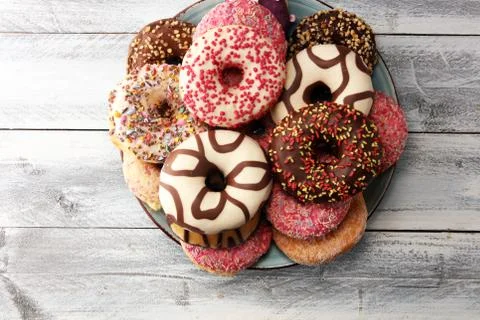 Donuts in different glazes Stock Photos