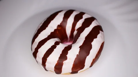 Donuts donut doughnut doughnuts closeup texture video on rolling rotating Stock Footage 104334082