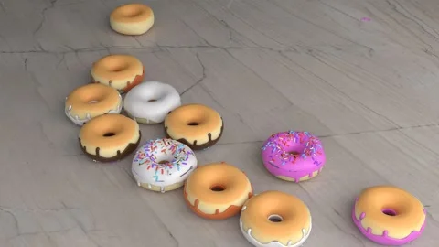 Donuts fall from plate Stock Footage 298970403