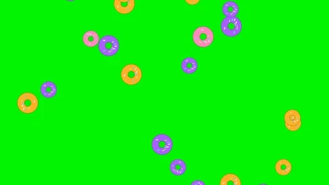 Donuts falling on green screen overlay 4K Видео 337062974
